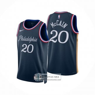 Camiseta Philadelphia 76ers Jared McCain NO 20 Ciudad 2025-26 Azul
